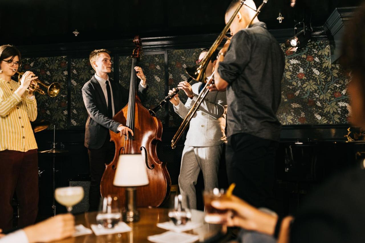 The Ned Hotel London Exterior photo Jazz band at the restaurant